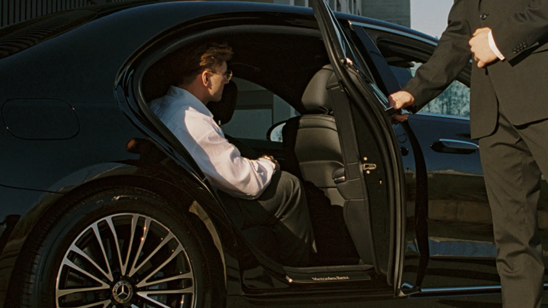Luxury vehicles waiting for clients at the airport for transfer service